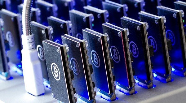 mining bitcoin pagato la metà